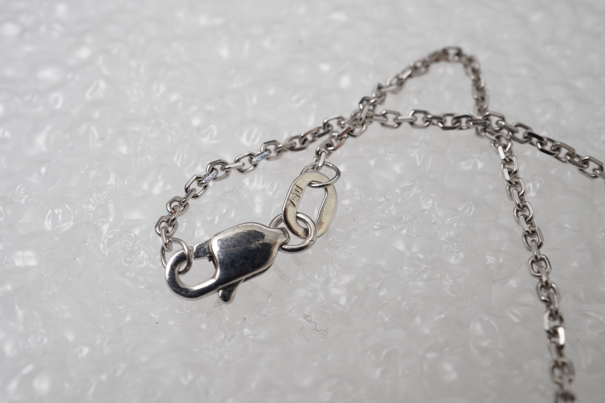 A diamond and tsavorite pendant necklace